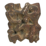 Plaster sculpture depicting a group of 3 figures