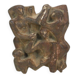 Plaster sculpture depicting a group of 3 figures