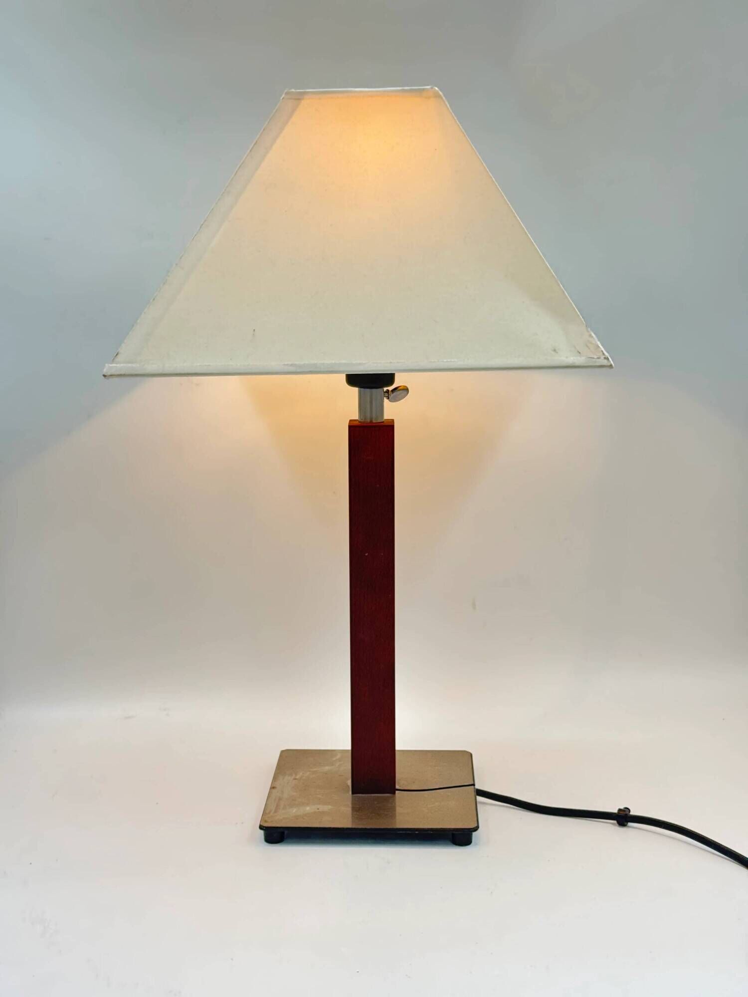 Vintage table lamp with a square wooden column and brushed steel base.
