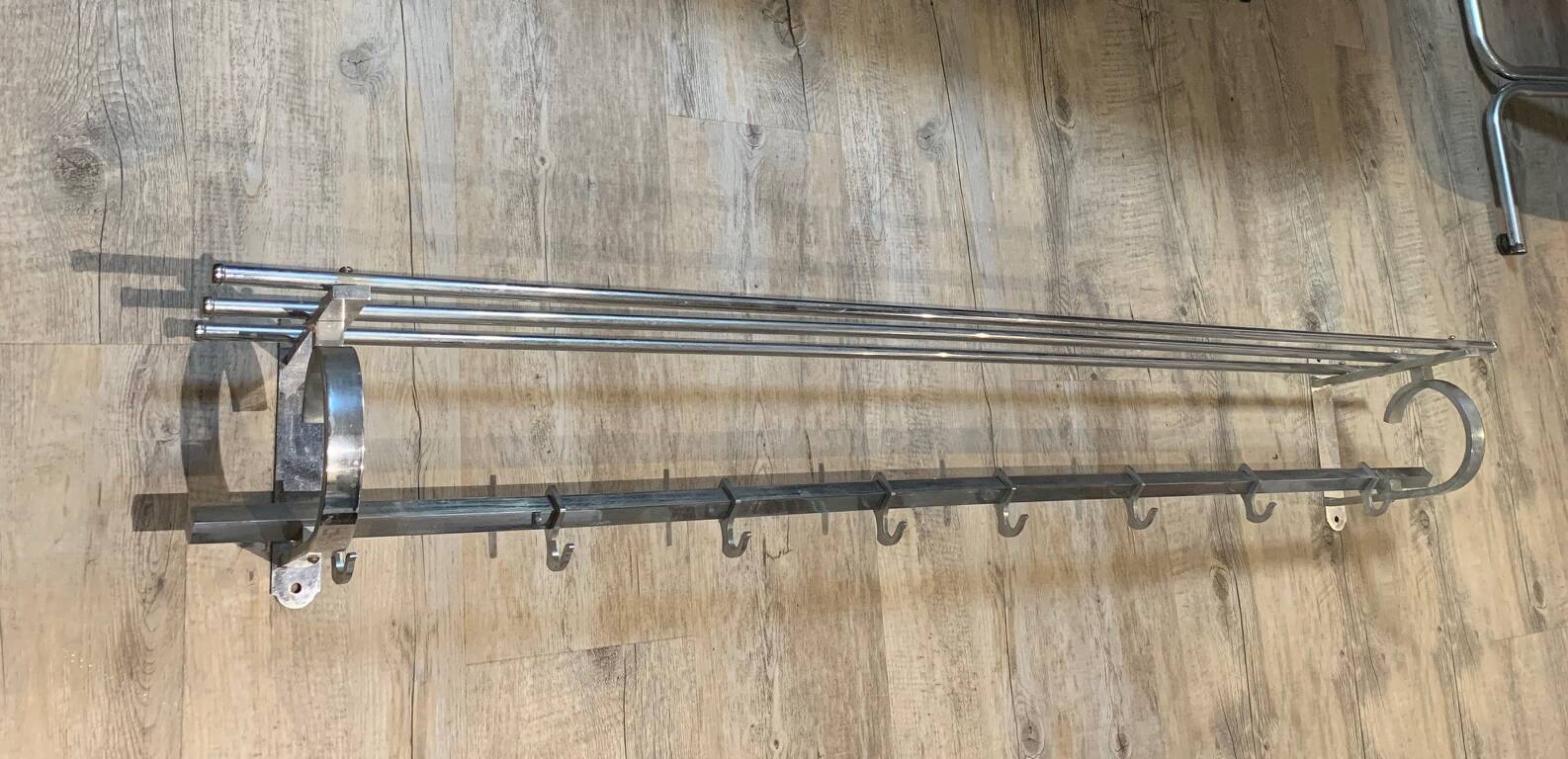 Large chrome metal wall coat rack with Art Deco shelf