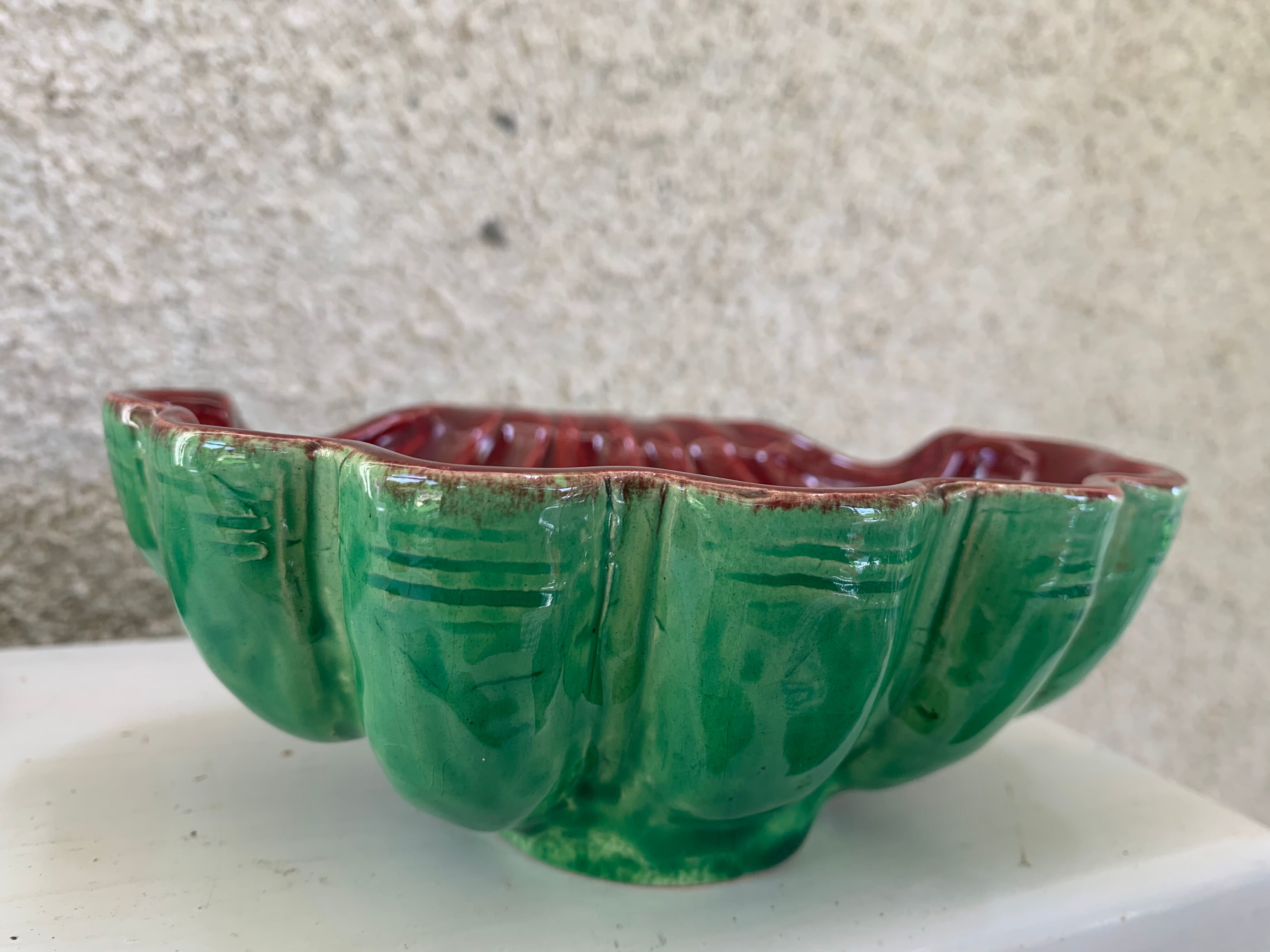 Green and red vintage dabbling enamelled ceramic shell