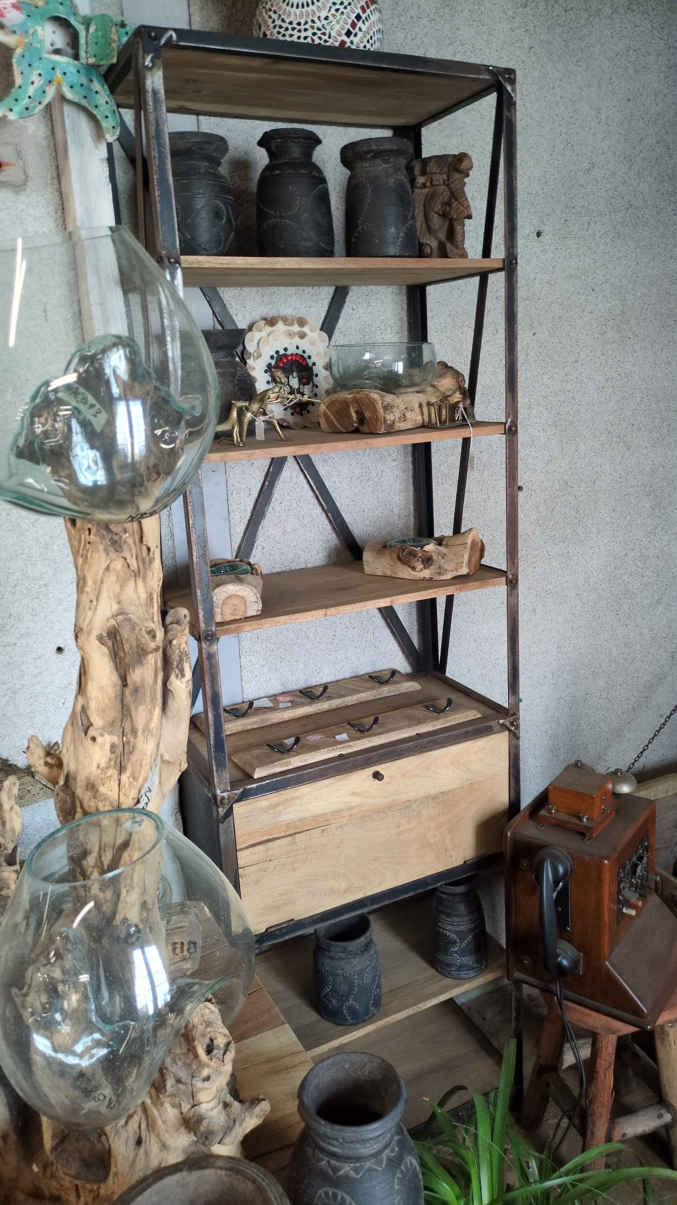 Industrial shelf made of solid exotic mango wood with riveted metal.