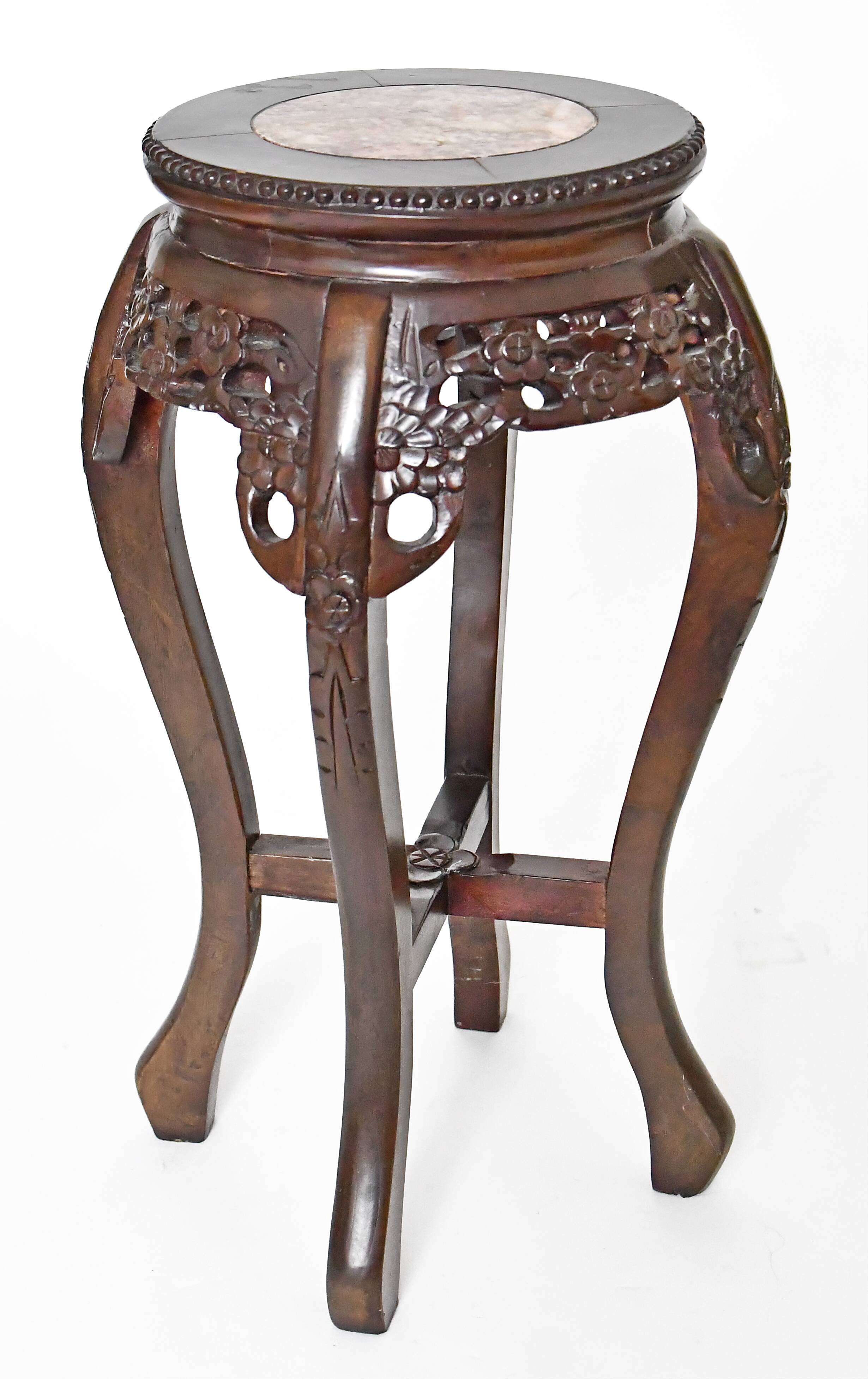 Chinese harness in richly carved wood and marble top