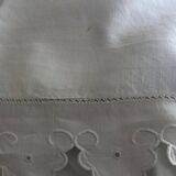 Pair of 19th century linen thread pillowcases embroidered with scallops
