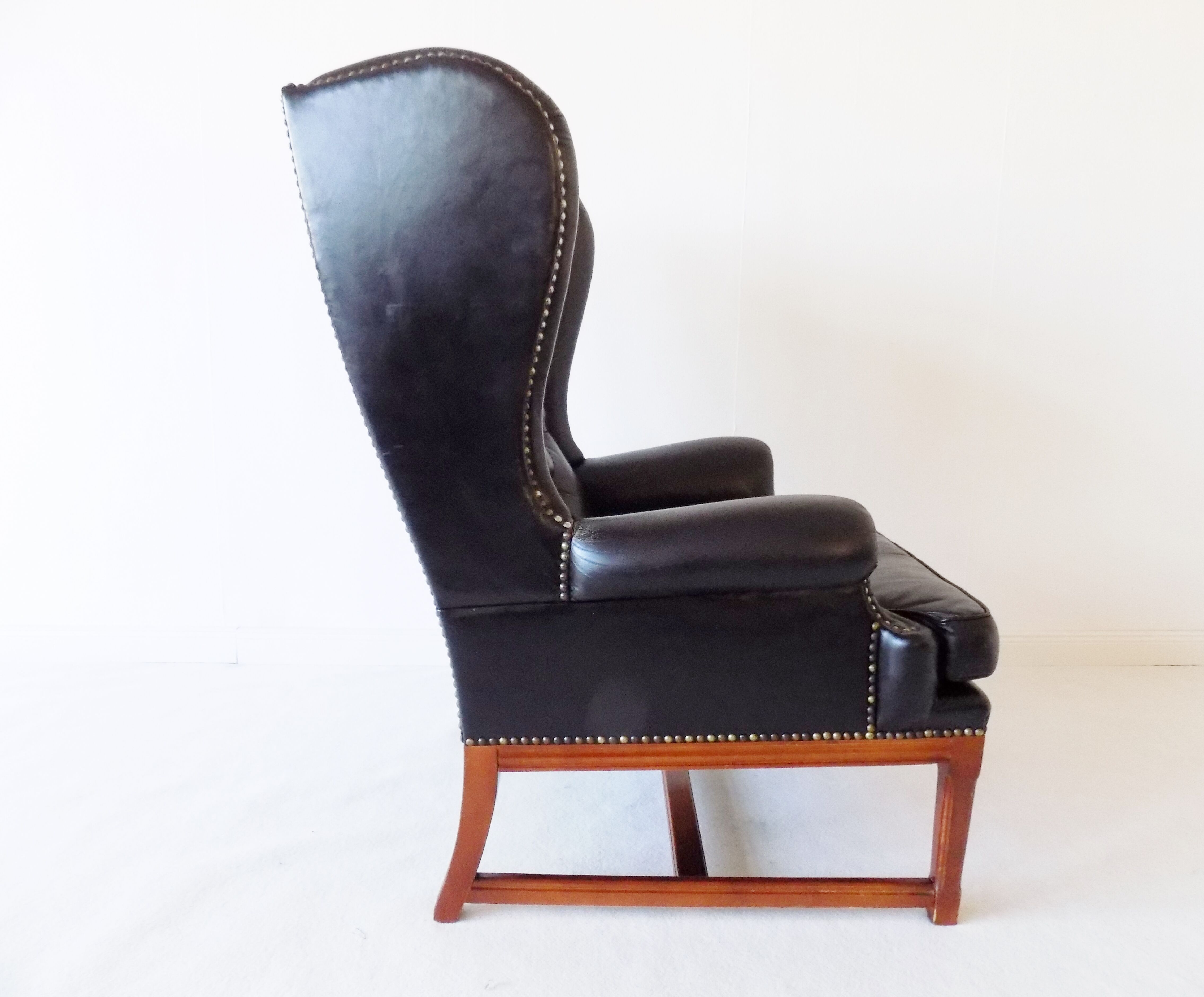 Chesterfield high back leather armchair black from the 1960s