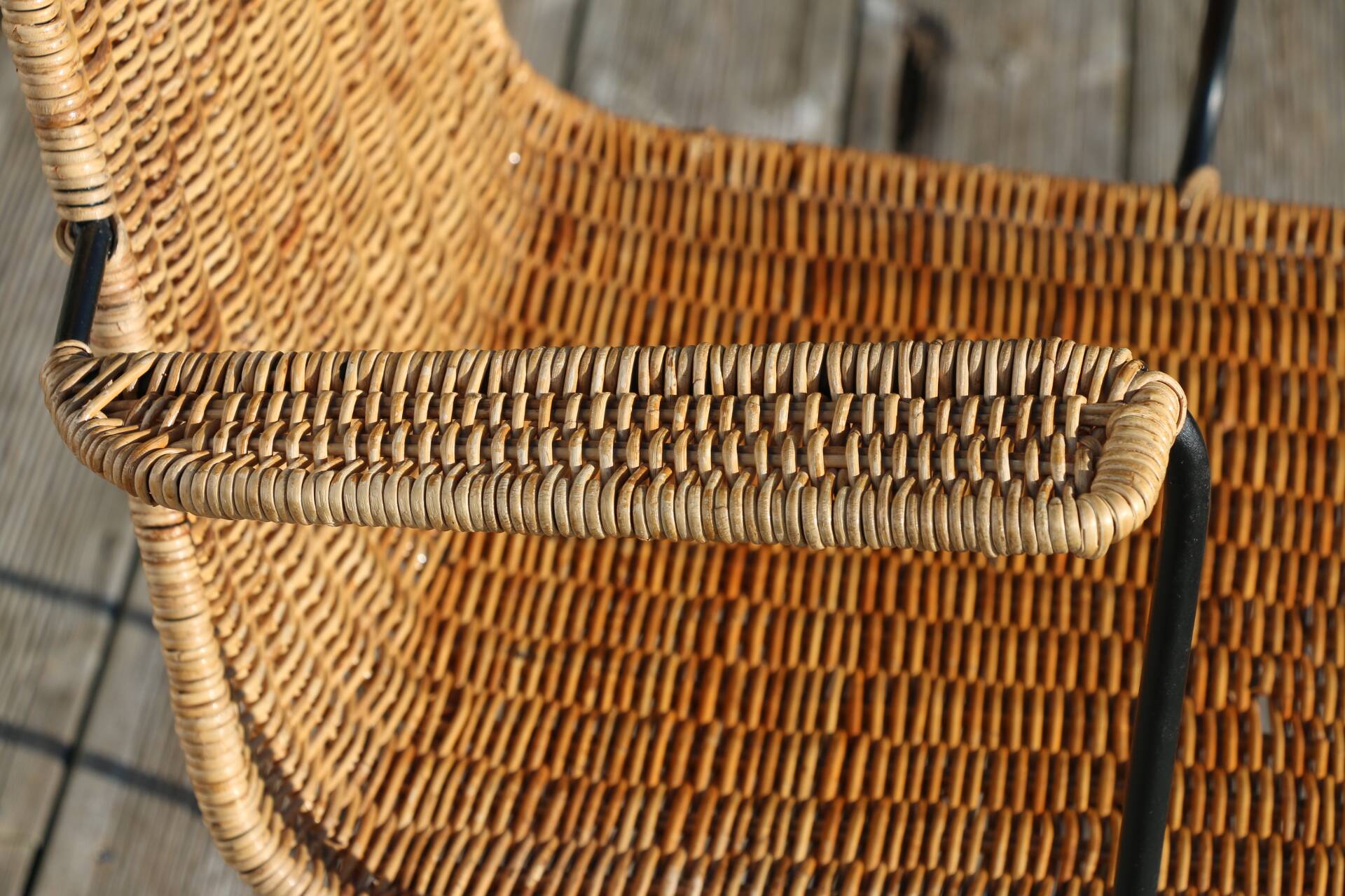 Rattan and steel armchair