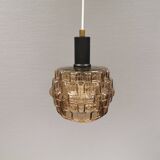 Older hanging lamp with champagne colored outer glass with inner shade of crystal glass.