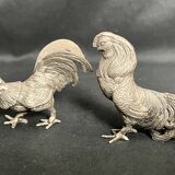 Showcase objects, two 20th century metal rooster and hen subjects