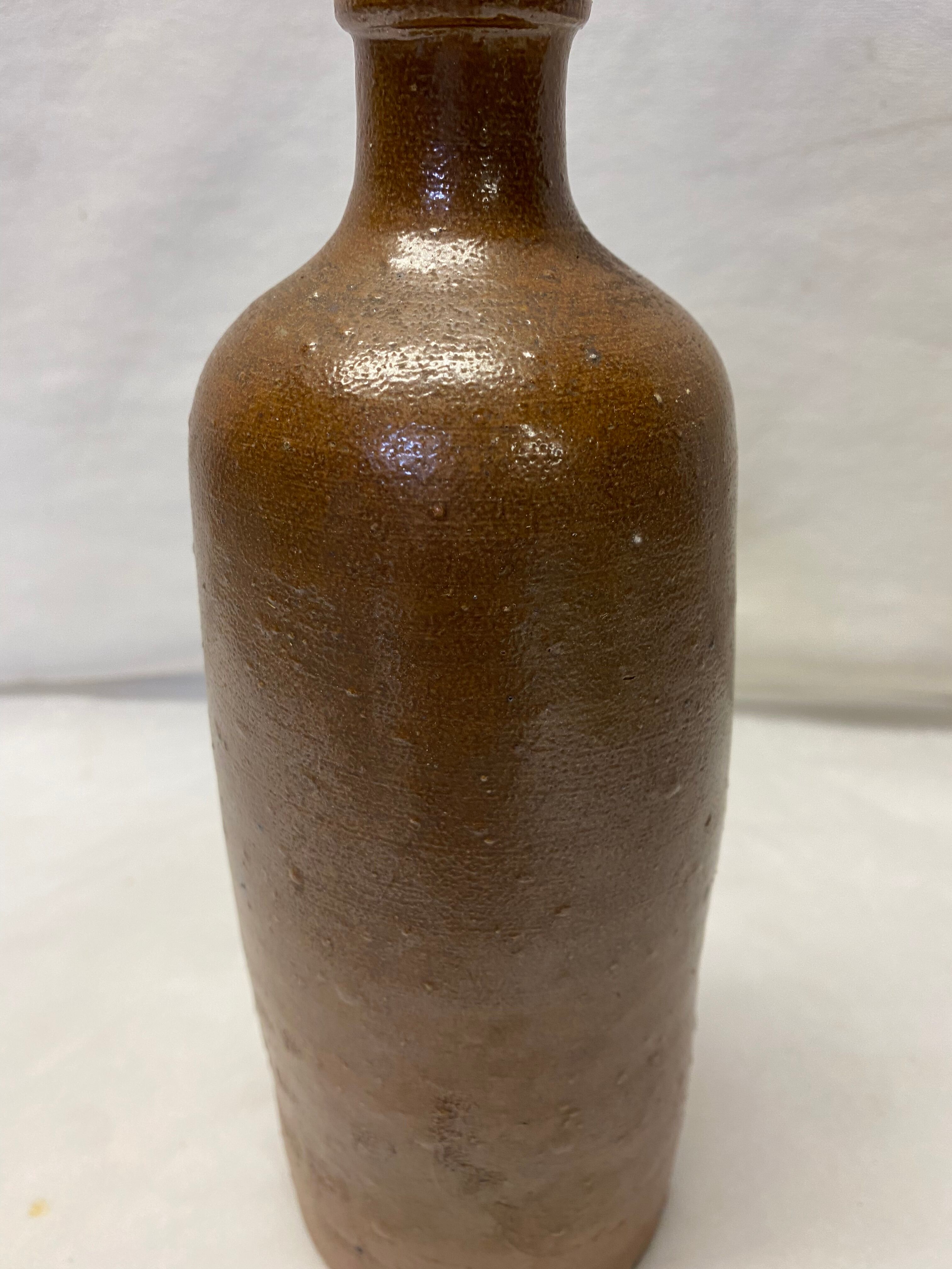Vintage brown stoneware bottle