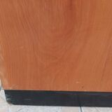 Workshop furniture with drawers and curtain in beech and walnut.