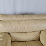 Fauteuil avec pouf en cuir et daim