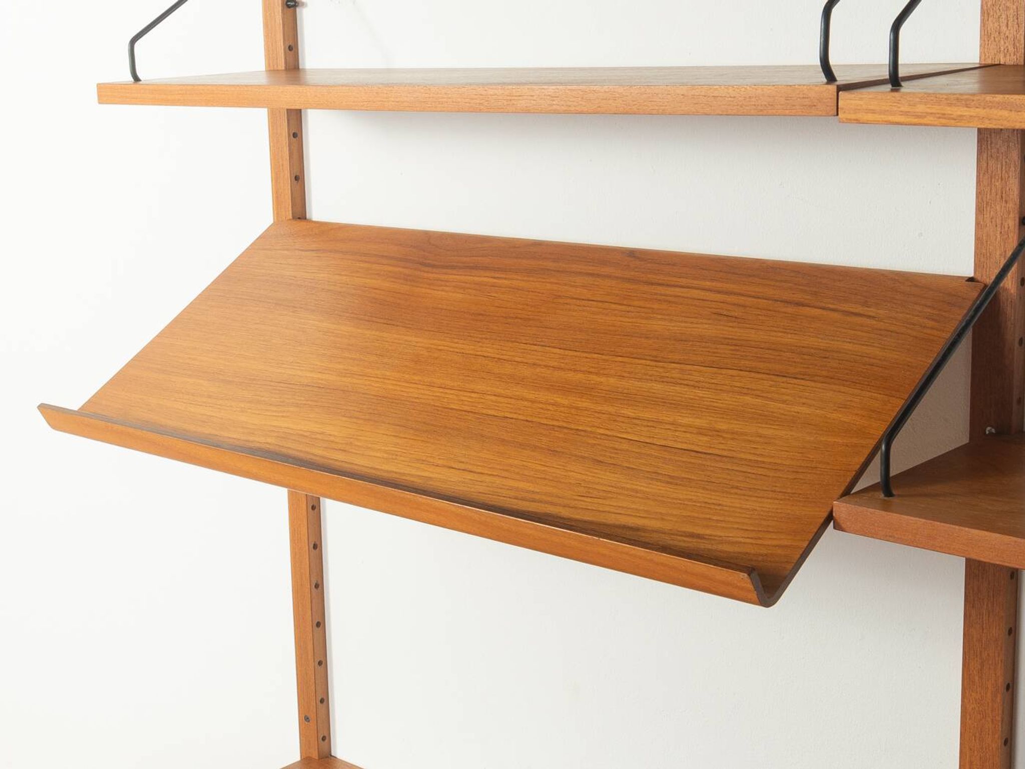 Classic shelving system from the 1960s in teak veneer by Poul Cadovius for Cado