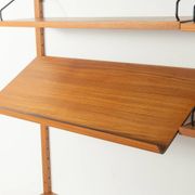 Classic shelving system from the 1960s in teak veneer by Poul Cadovius for Cado
