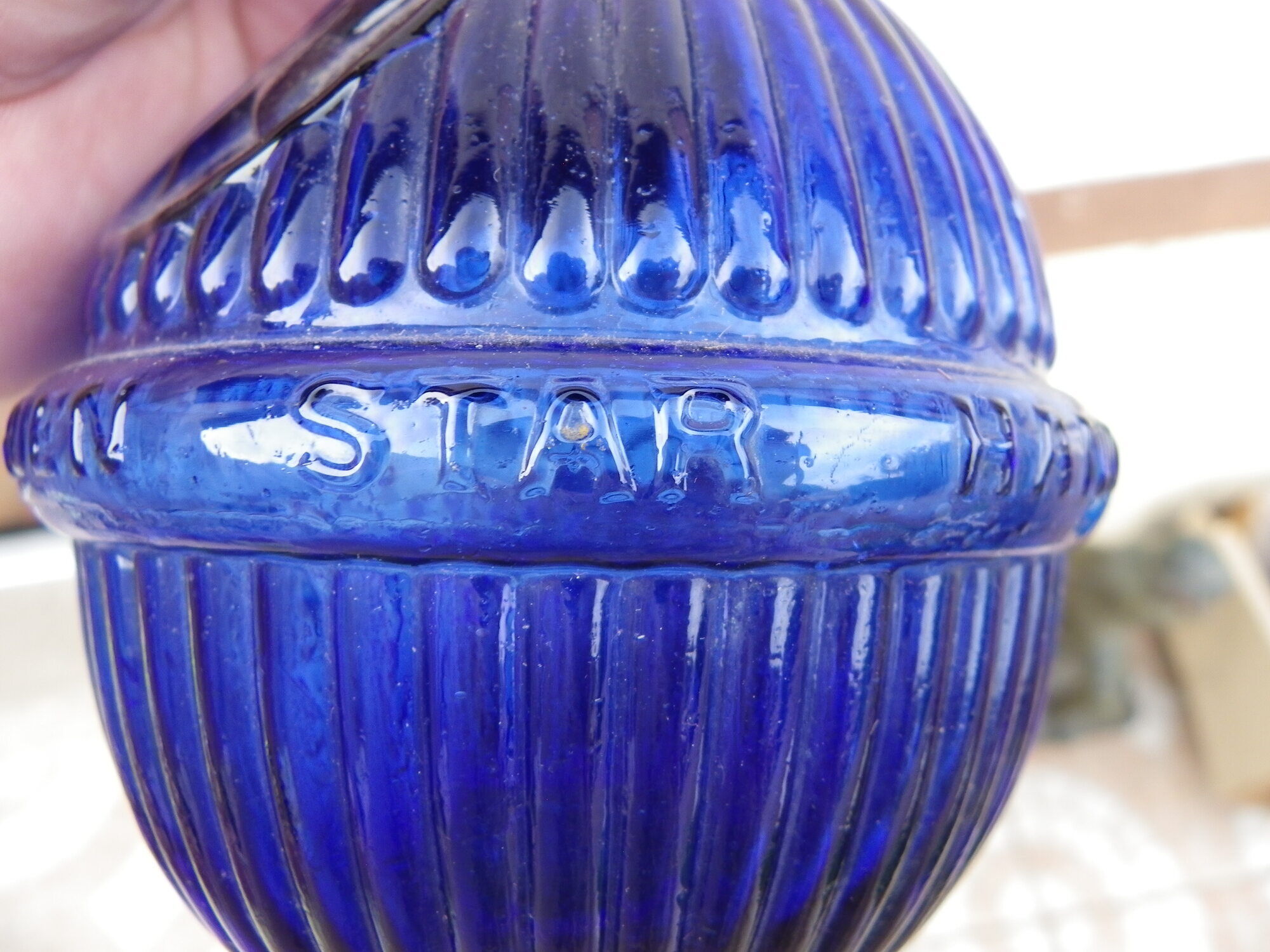 HARDEN fireplace fire extinguishing grenade in fluted blue glass, marked "Star". Rare decoration