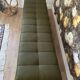 Wooden bench and green fabric