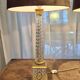 Pair of coloured table lamps, made of cut crystal and gilded bronze, in the Baccarat style.