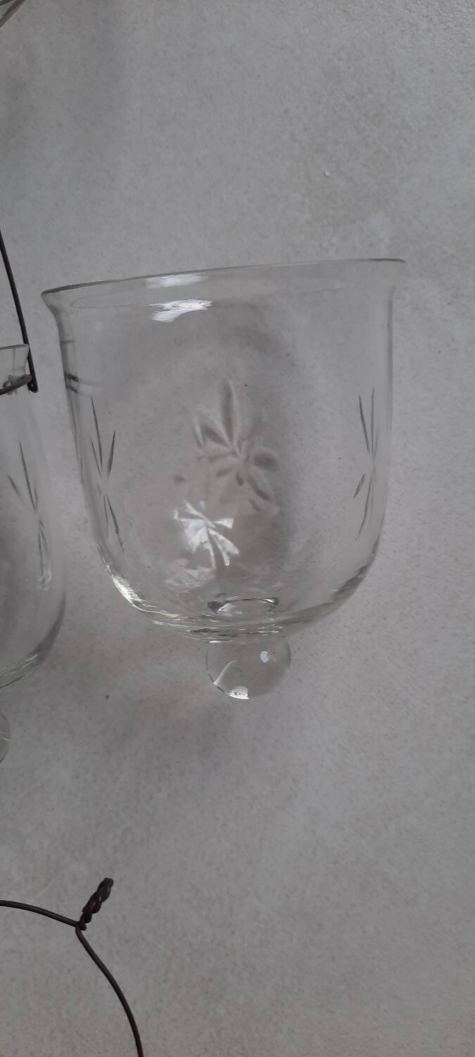 Set of hanging glass and metal tealight holders