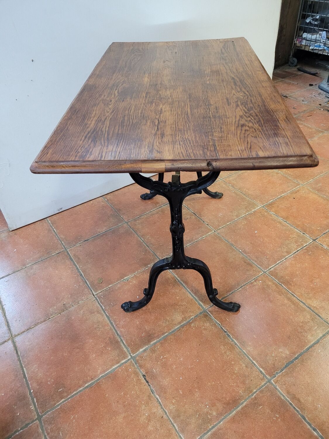 Old bistro table with oak top