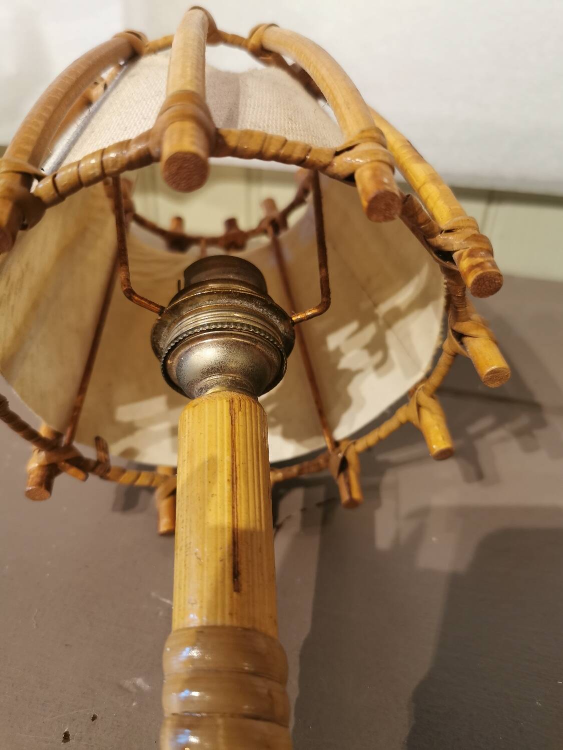 Vintage rattan wall light by Louis Sognot