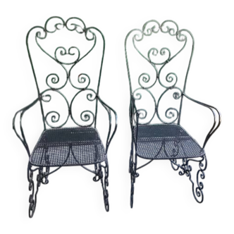 Pair of black wrought iron armchairs