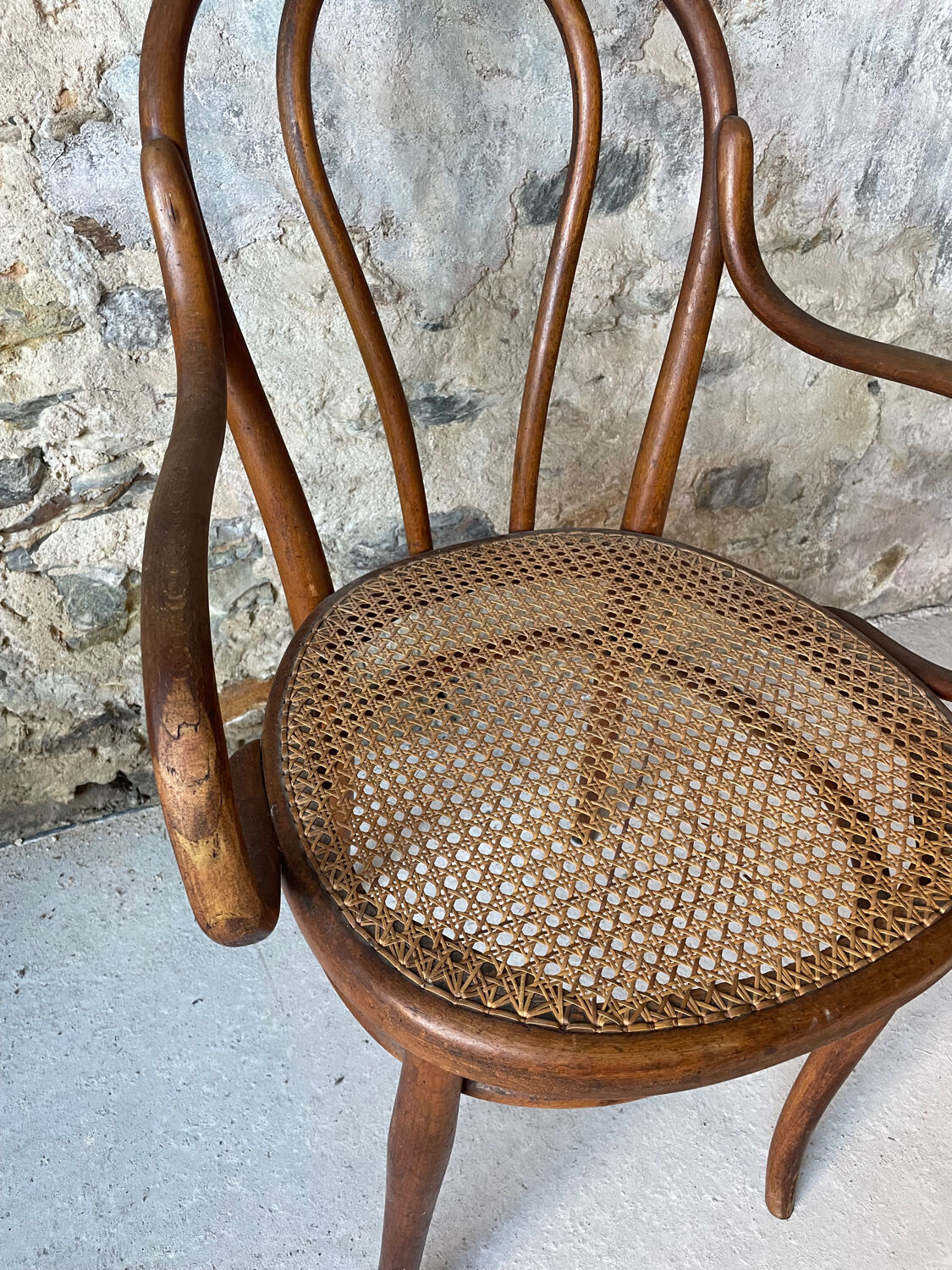 Thonet armchair with bent wood and caning