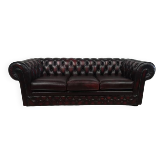 Three-seater chesterfield burgundy leather sofa
