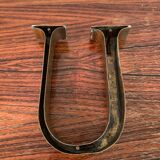 Golden sign letter “U”