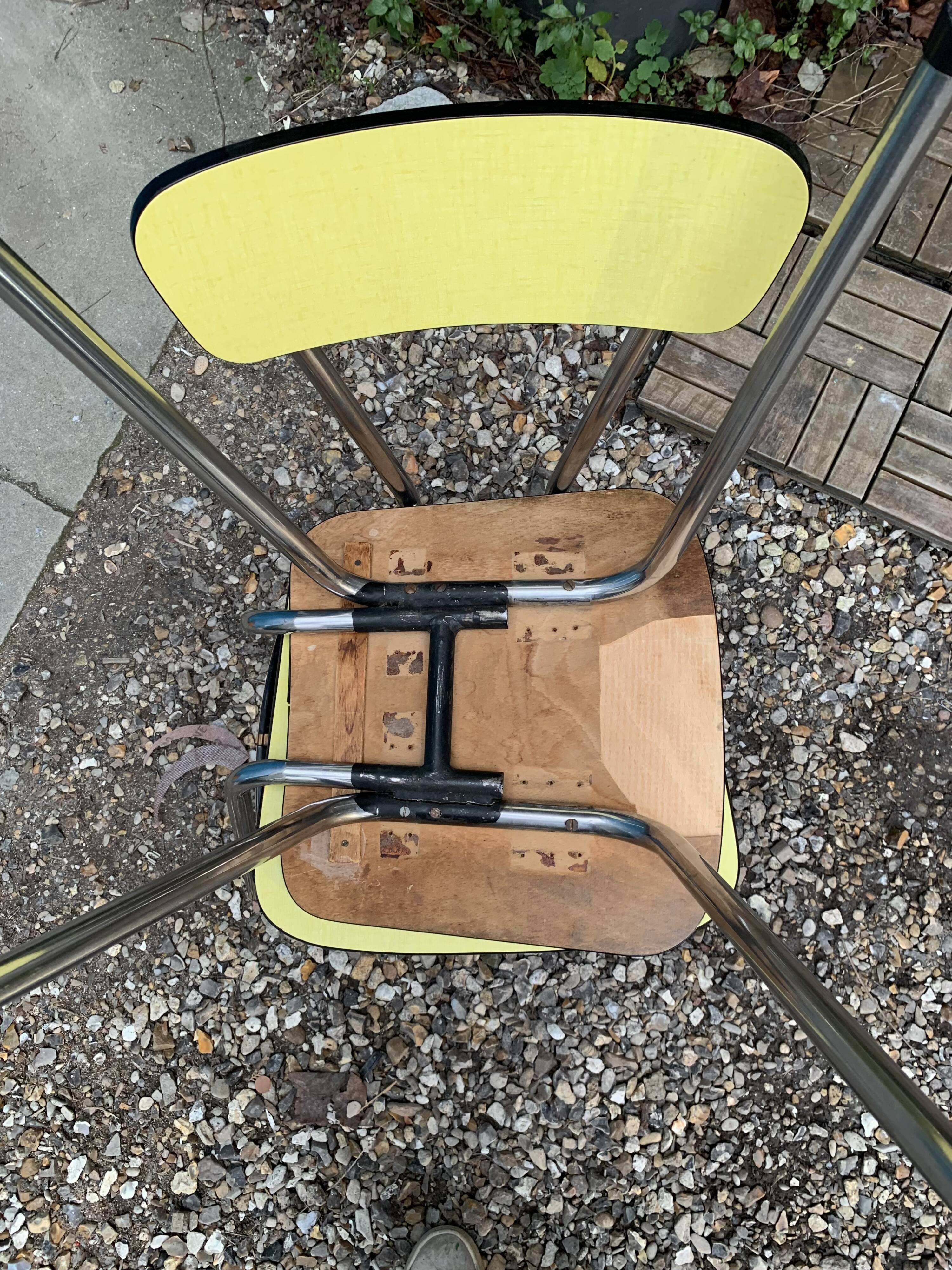 Yellow Formica chairs with compass legs, 1950s