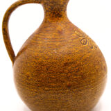 Brown pitcher and saffron yellow with naïve flowers of Accolay
