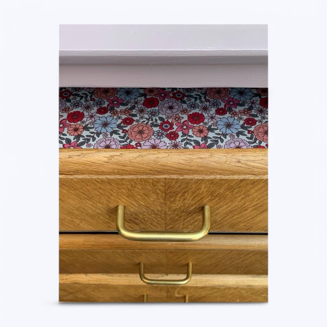 Vintage powder pink compass leg chest of drawers from the 1950s