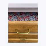 Vintage powder pink compass leg chest of drawers from the 1950s