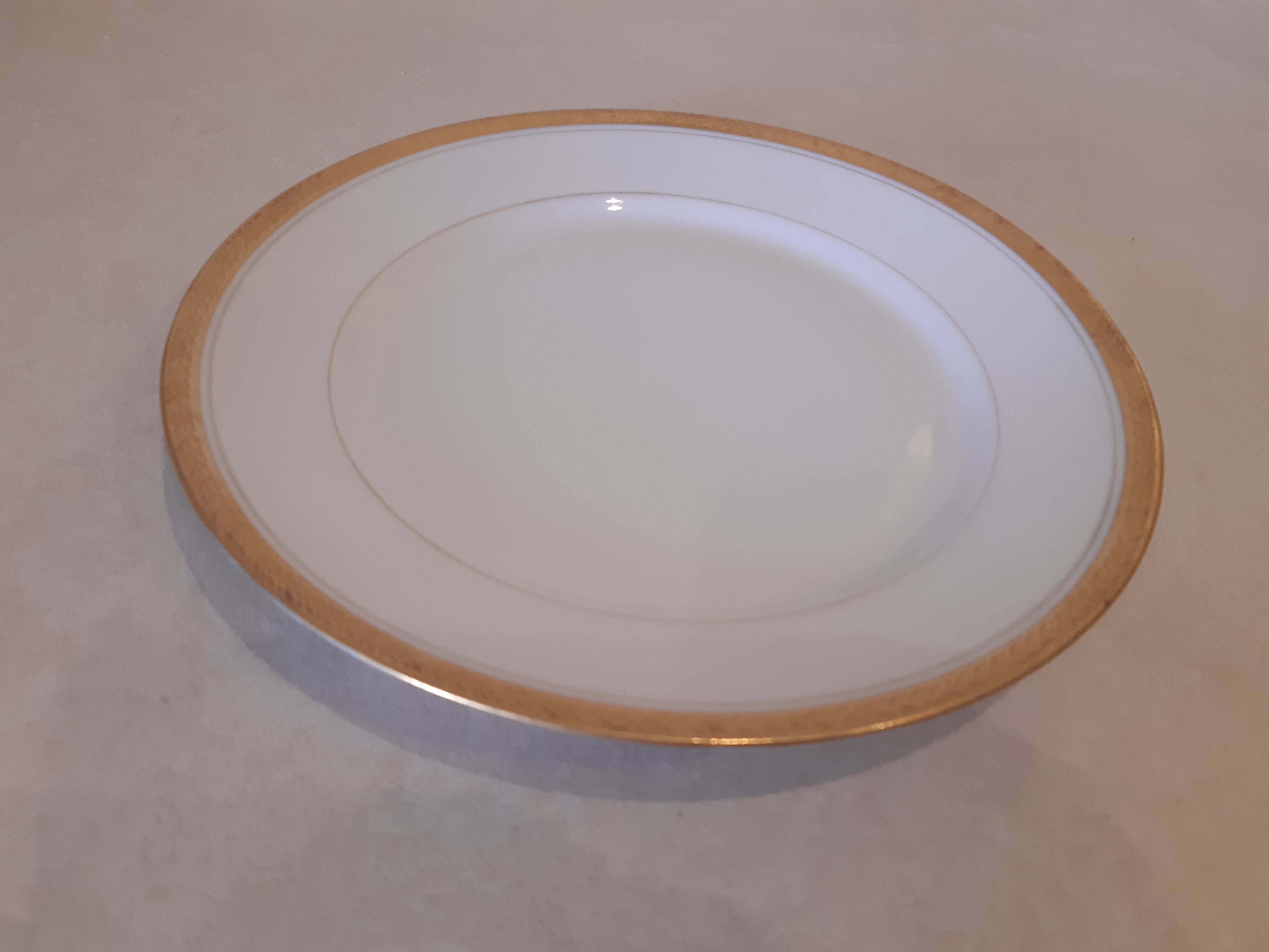 Porcelain plate with gold trim