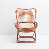 Armchair in rattan with footrest of Tito Agnoli for Pierantonio Bonacina 1960
