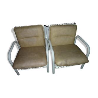pair of iron armchairs