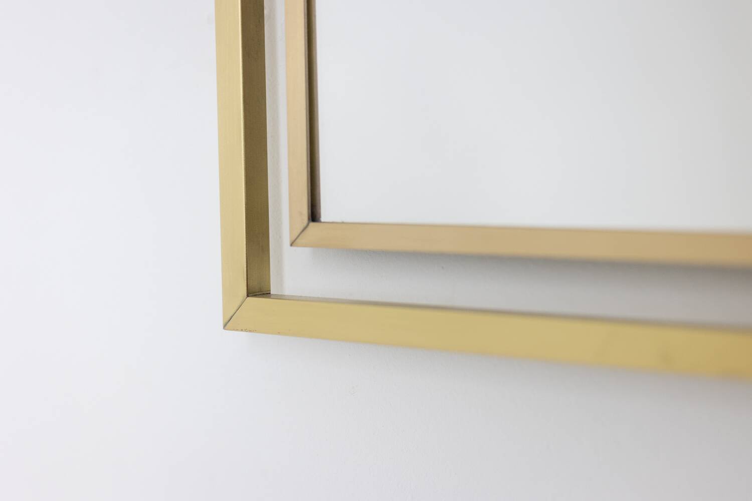 “Boizot” model mirror in brass, varnished finish. Contemporary.