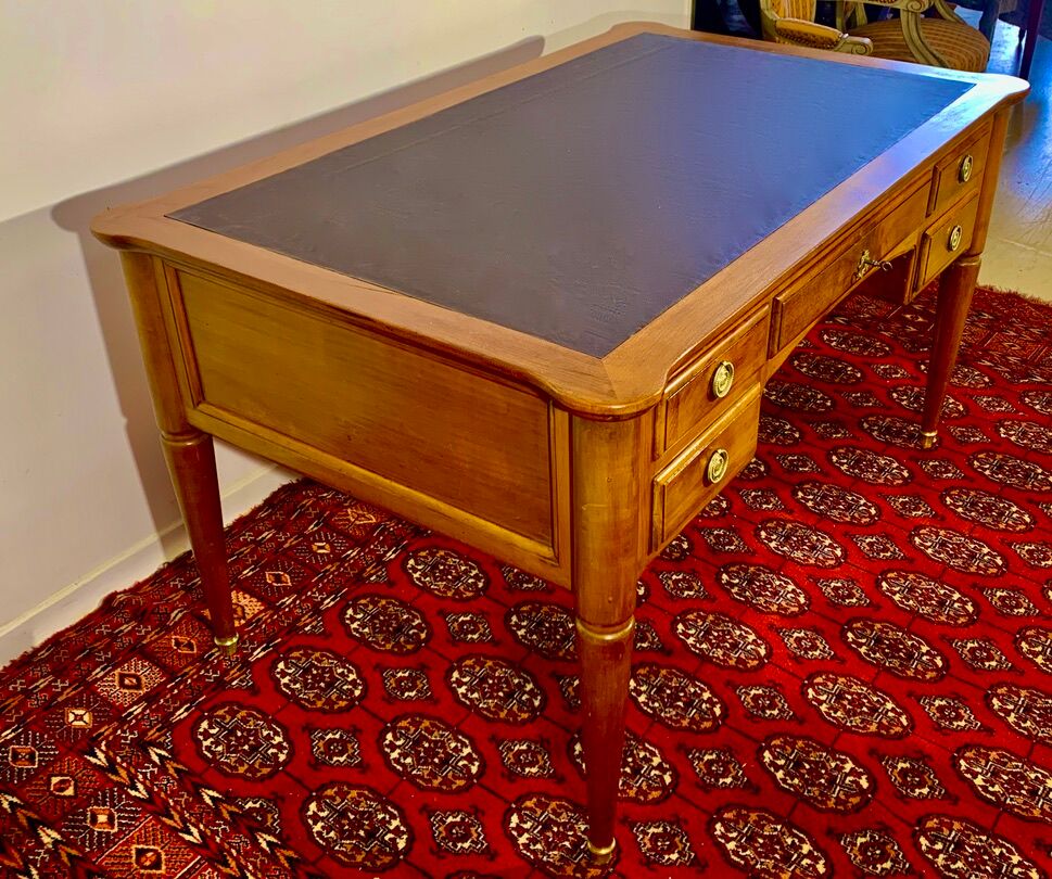 Louis XVI desk in cherry wood and gilded bronzes