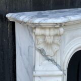 Louis XV style fireplace in white Carrara marble arabescato