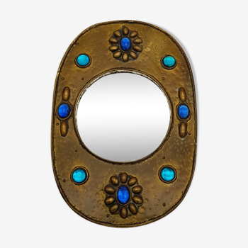 Brass oval mirror and blue cabochons