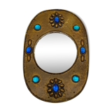 Brass oval mirror and blue cabochons