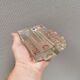 Pukeberg Walther Glass rectangular “solifleur” glass vase with one stem.