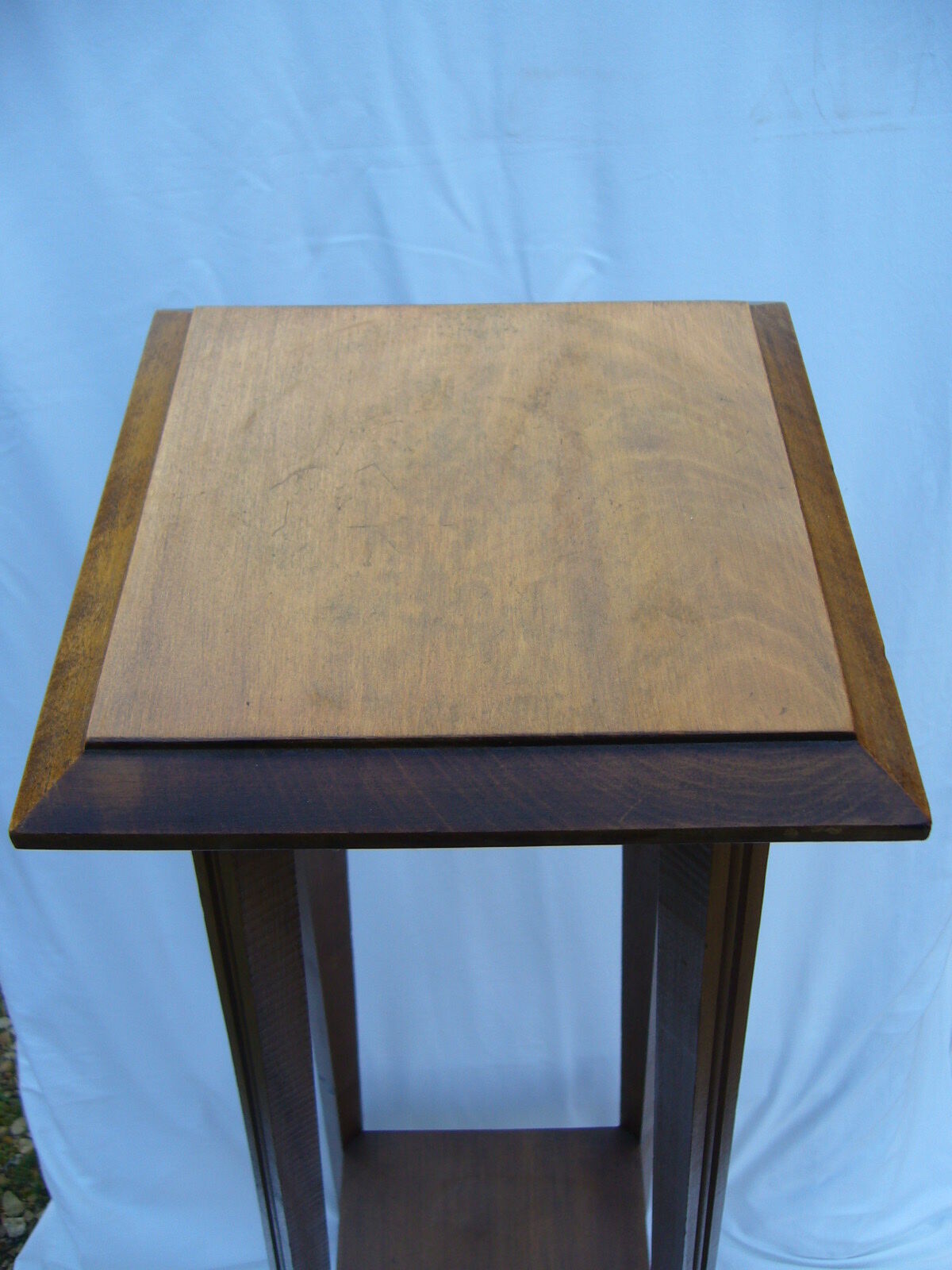 Art deco side table in varnished wood