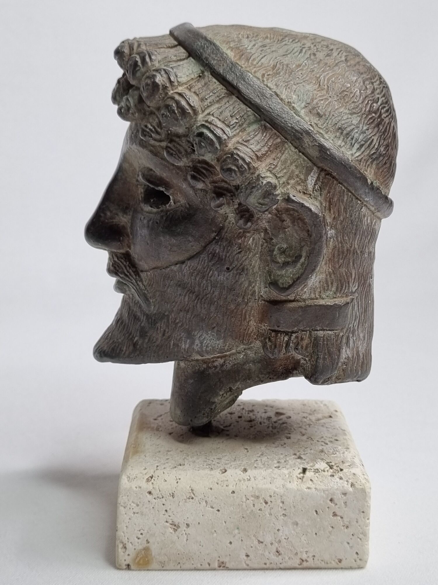 Head of Zeus in patinated plaster in imitation of bronze, 15 cm
