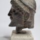 Head of Zeus in patinated plaster in imitation of bronze, 15 cm