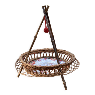 Canton plate surrounded by 19th century wicker