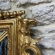 Antique mirror with a frame 123/100cm with gilded pediments, eagle heads, antique.