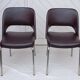 Pair of vintage faux leather and chrome armchairs