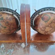 Pair of vintage bookends with rotating terrestrial globes on wooden bases in Spain