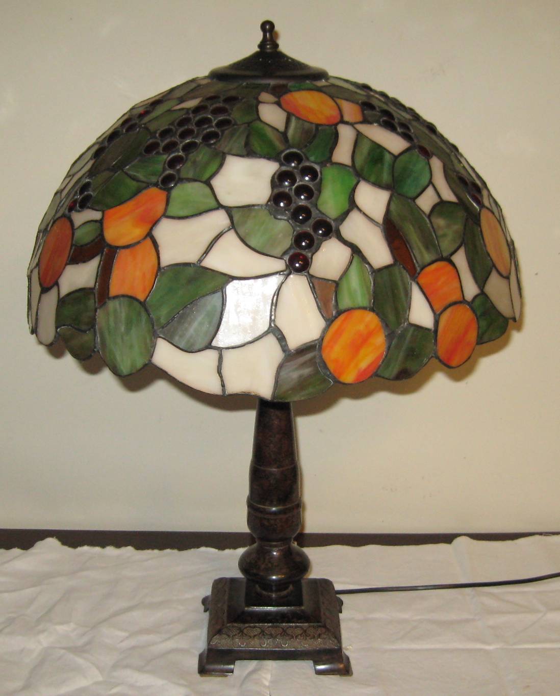 Tiffany-style lampshade with fruits and grapes