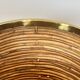 Rattan and brass wastepaper basket in the style of Gabriela Crespi.