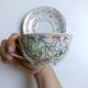 Large porcelain cup from Bavaria with a pearlescent finish and rose decorations.